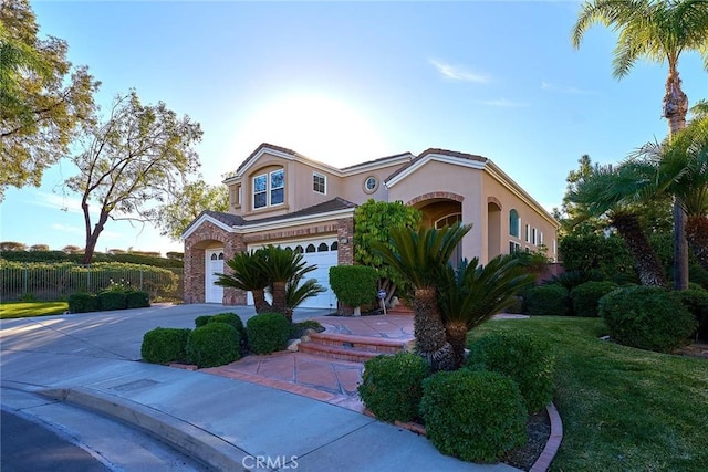 view of front of property with a garage