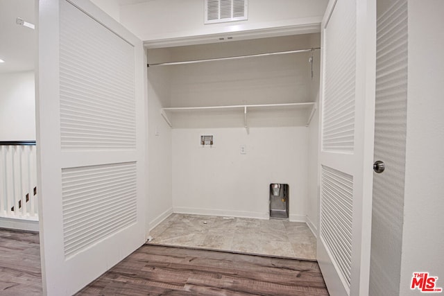 laundry room featuring hookup for a washing machine and hardwood / wood-style floors