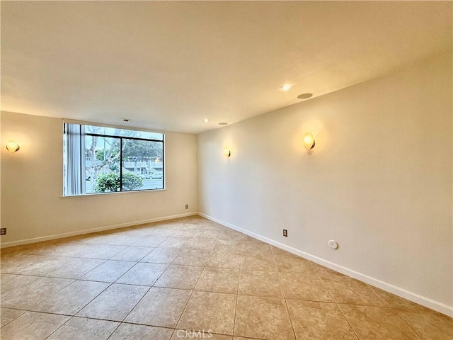 view of tiled spare room