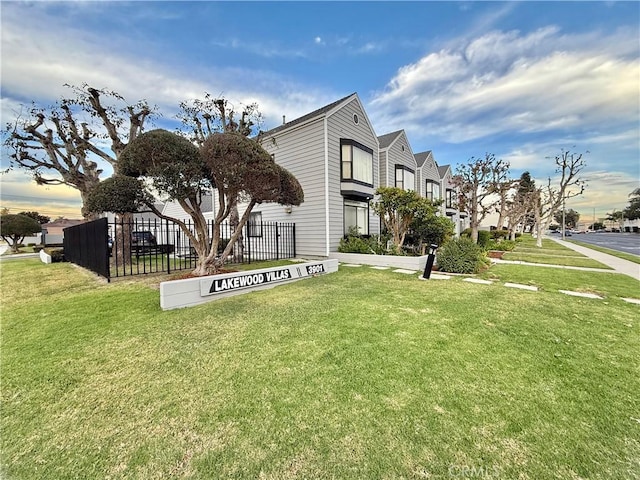 view of community with a lawn