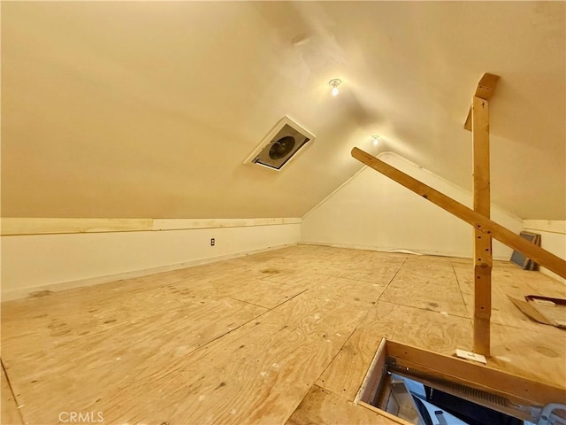 bonus room with vaulted ceiling