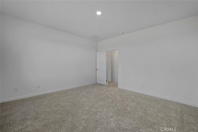 view of carpeted spare room