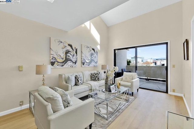 living room with light hardwood / wood-style flooring