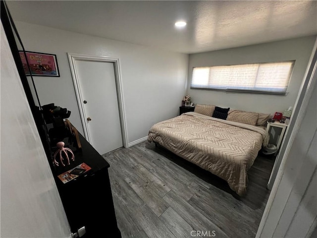 bedroom featuring hardwood / wood-style floors