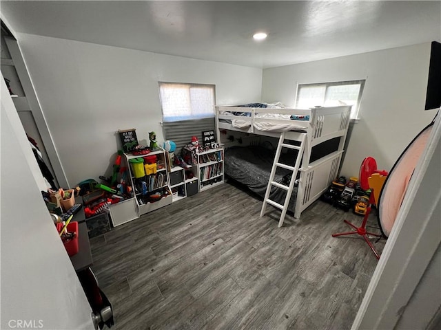 bedroom featuring dark wood-type flooring