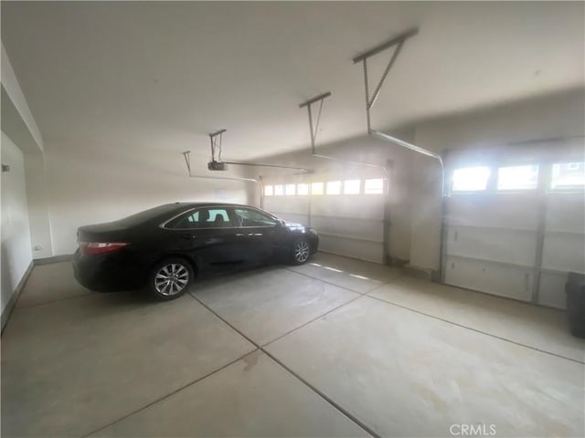 garage featuring a garage door opener