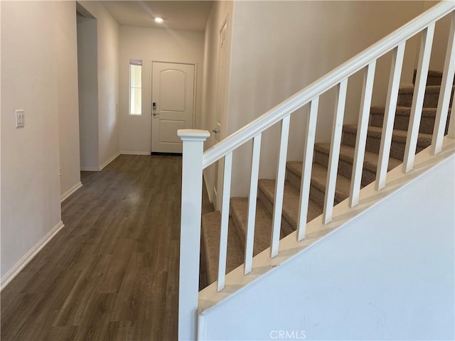 foyer entrance featuring dark hardwood / wood-style flooring