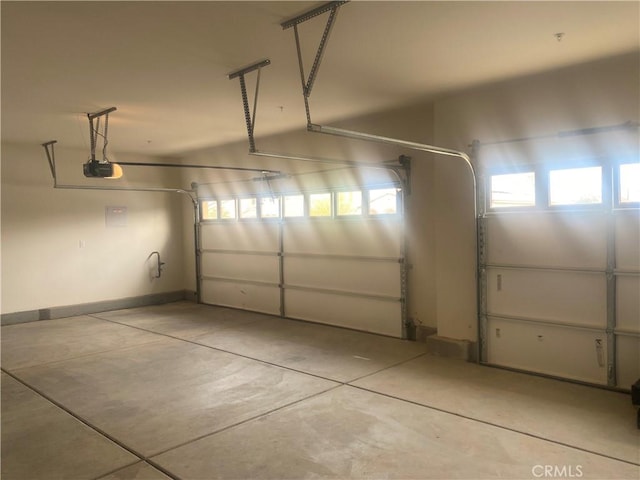 garage featuring a garage door opener