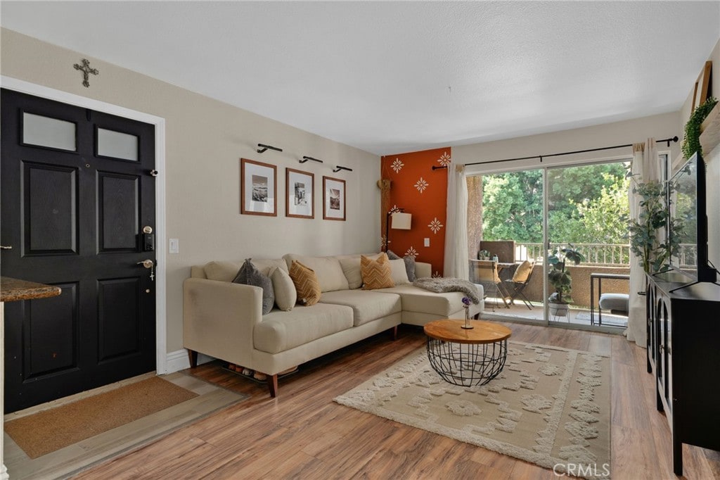 living room featuring wood-type flooring