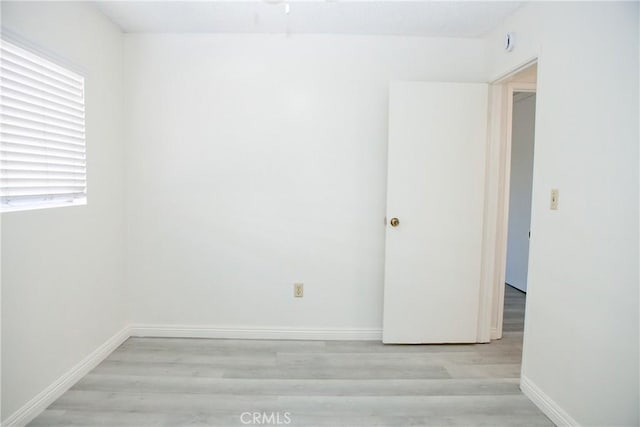 empty room with light wood-type flooring