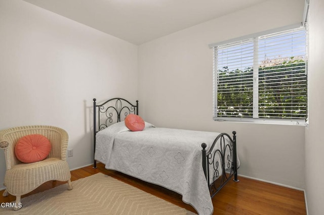 bedroom featuring hardwood / wood-style floors