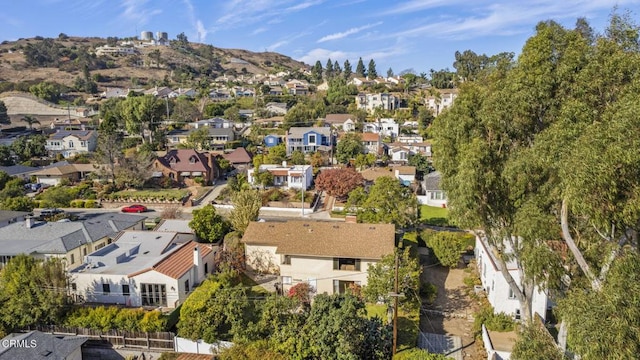 birds eye view of property featuring a residential view and a mountain view