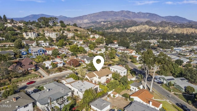 aerial view featuring a residential view and a mountain view