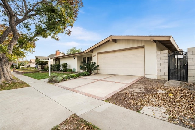 ranch-style house featuring a garage