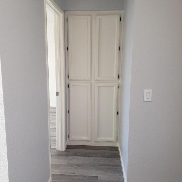 hallway with light wood-type flooring