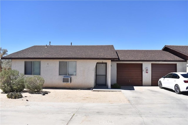 ranch-style house featuring a garage