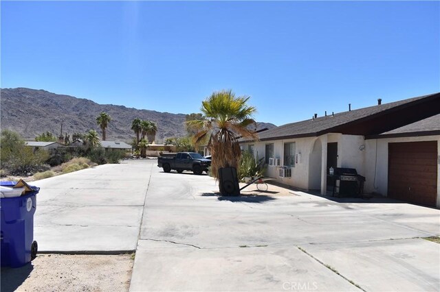 exterior space featuring a mountain view