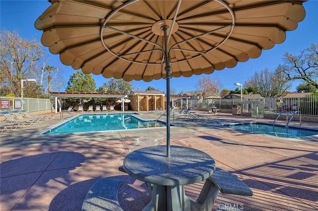 view of pool with a patio