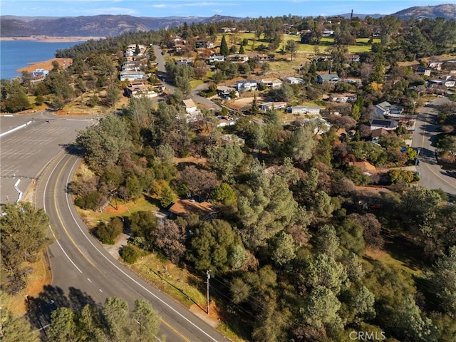 bird's eye view featuring a water and mountain view