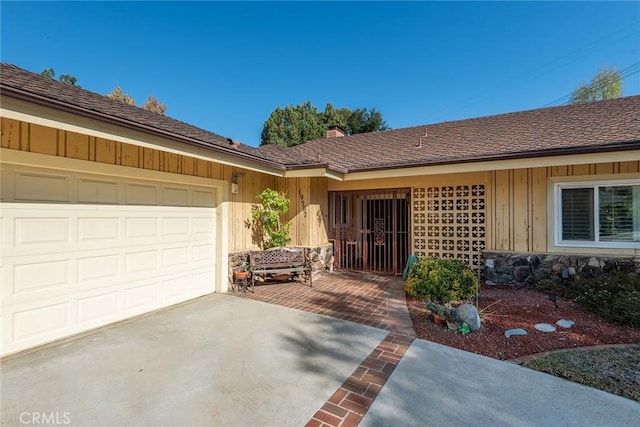 view of front of property with a garage