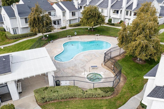 view of swimming pool with a patio