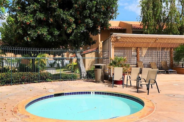 view of swimming pool featuring a patio