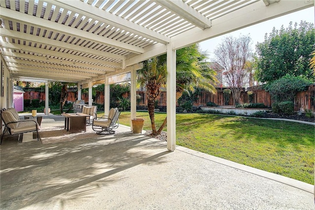 view of patio / terrace with a pergola and an outdoor fire pit