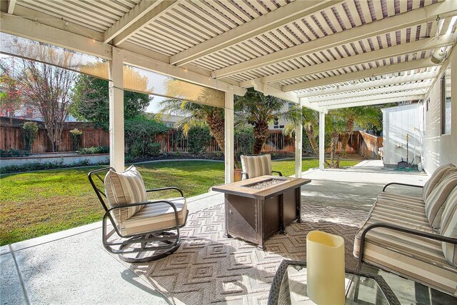 view of patio / terrace with a pergola and an outdoor fire pit