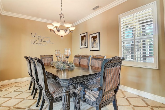 dining room featuring an inviting chandelier, tile patterned floors, and ornamental molding