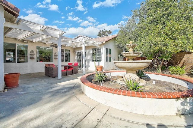 view of patio / terrace with an outdoor hangout area, ceiling fan, and a pergola