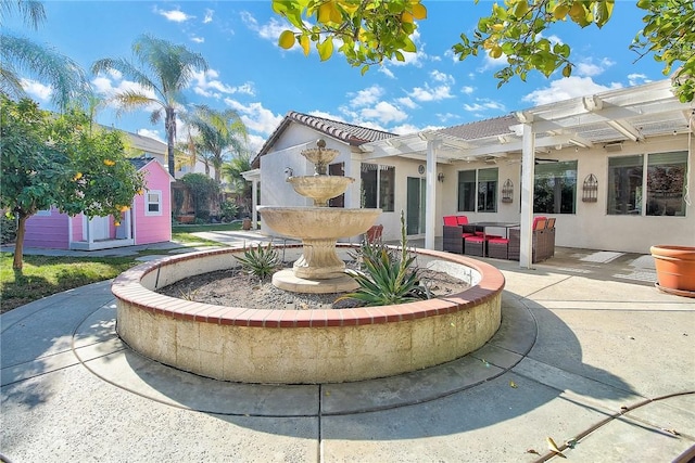 exterior space with a patio and a pergola