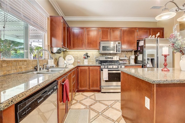 kitchen with tasteful backsplash, light stone countertops, ornamental molding, stainless steel appliances, and a sink