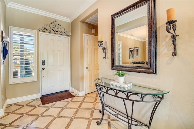 foyer entrance featuring crown molding