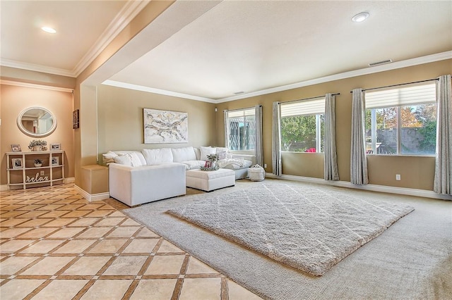 living area with visible vents, recessed lighting, crown molding, and baseboards