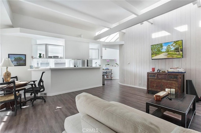 253 Fairview St, Laguna Beach, CA 92651 - living area with baseboards, lofted ceiling with beams, and wood finished floors