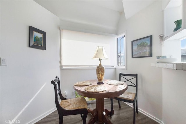 253 Fairview St, Laguna Beach, CA 92651 - dining area featuring baseboards and dark wood-type flooring