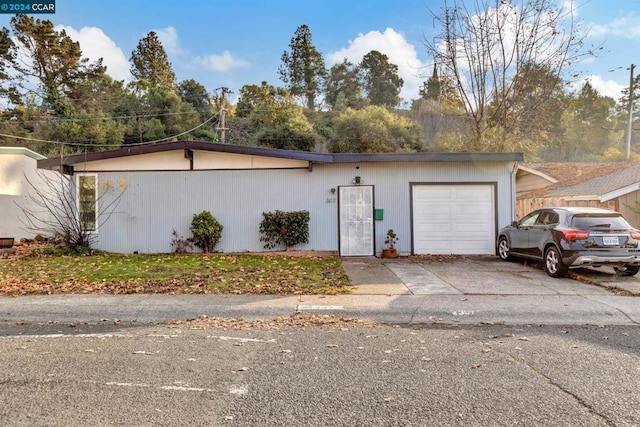 ranch-style home with a garage