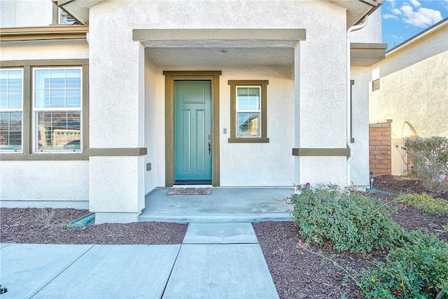 entrance to property with a porch