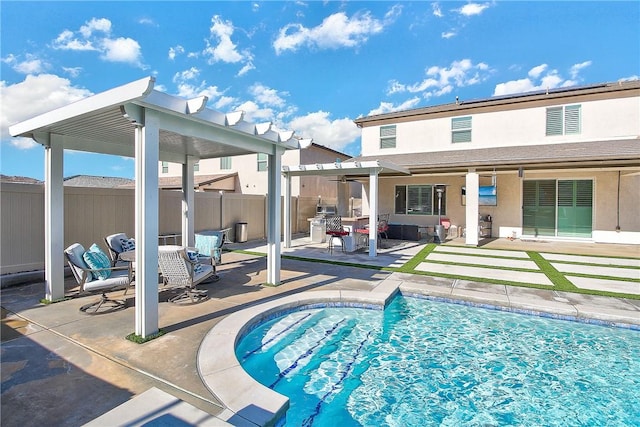 view of pool with a patio area and a pergola