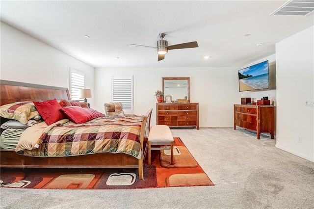 bedroom featuring ceiling fan and light colored carpet