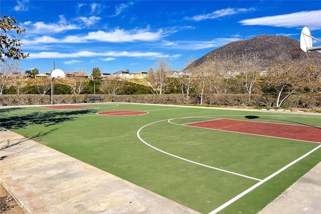 view of basketball court featuring a mountain view