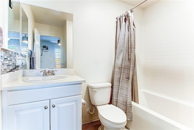 full bathroom with shower / tub combo, vanity, and toilet