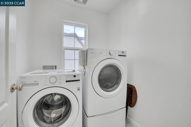 laundry area with separate washer and dryer