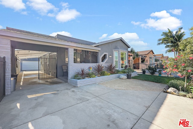 view of front of house with a carport