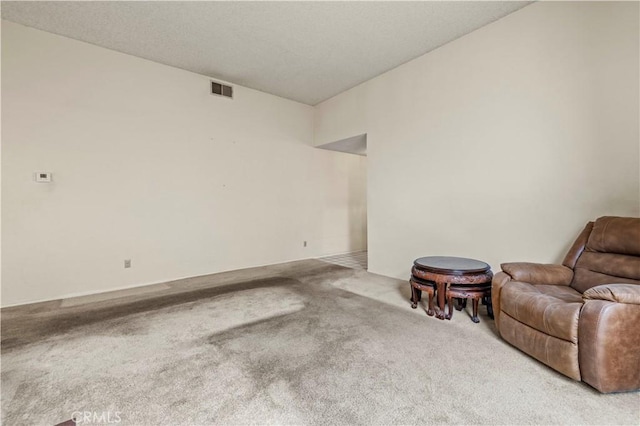 unfurnished room featuring carpet flooring