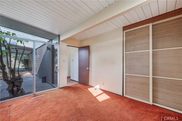 unfurnished bedroom featuring carpet floors