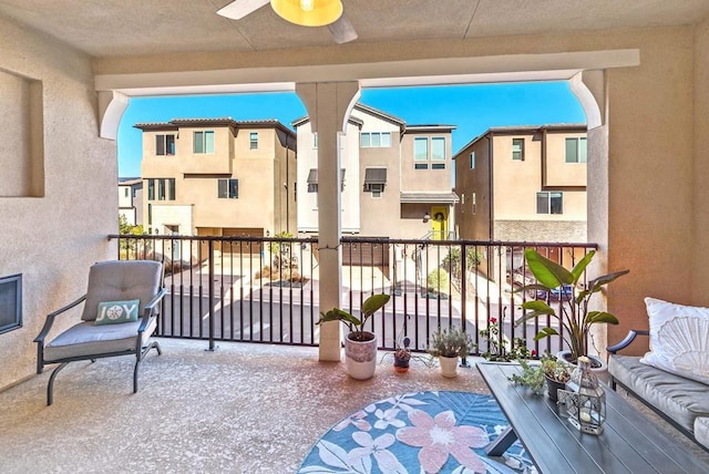 balcony featuring ceiling fan