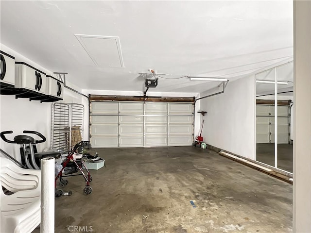 garage featuring a garage door opener