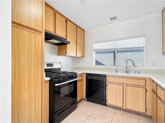 kitchen with black appliances, light tile patterned flooring, and sink