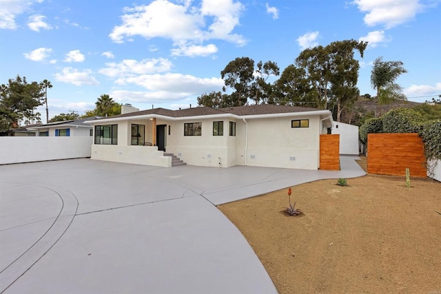 view of front of home with a patio